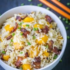 We love this bacon mango fried rice! The mango caramelizes with the crisp bacon - so good! 3 ingredients, 1 pan, 15 min | natashaskitchen.com