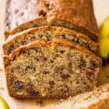 Banana bread sliced on a cutting board