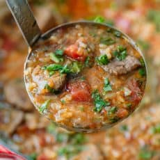 Beef Soup Kharcho: a hearty beef and tomato soup with a unique spice blend and plenty of fresh herbs. The tender beef in this beef soup melts in your mouth.