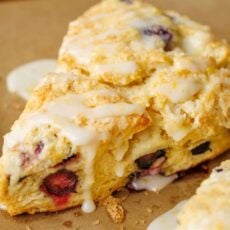 Blueberry scone drizzled with lemon glaze