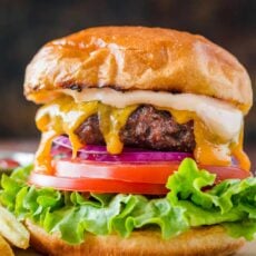 Hamburger with cheese served with fries