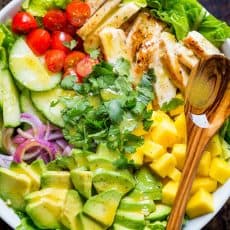 Chicken Mango Avocado Salad recipe in a bowl served like Cheesecake Factory recipe (copycat).