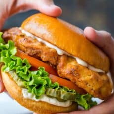 crispy chicken sandwich in hands