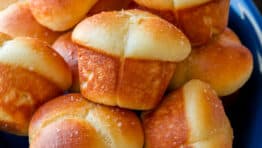 Cloverleaf Dinner Rolls on blue platter