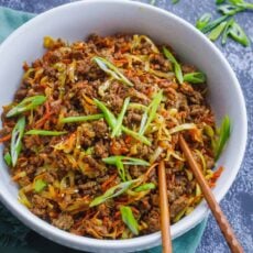 Egg Roll in a Bowl served with green onion and chopsticks