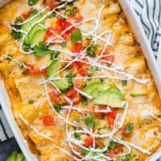 Chicken enchiladas in casserole dish