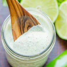 Jalapeno ranch in mason jar with spoon in jar