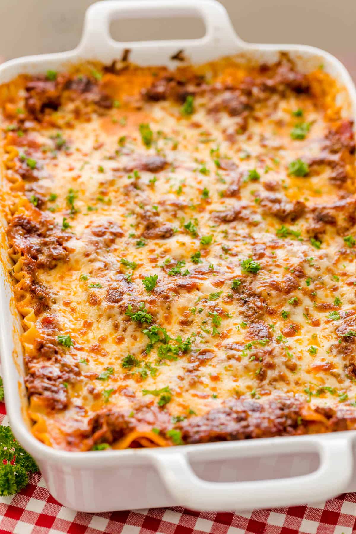 Dish of cheesy meat lasagna