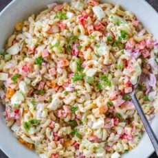 Creamy macaroni salad in serving bowl