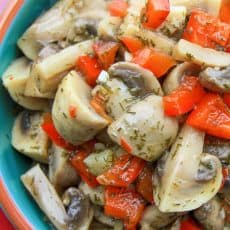 A bowl with marinated mushrooms