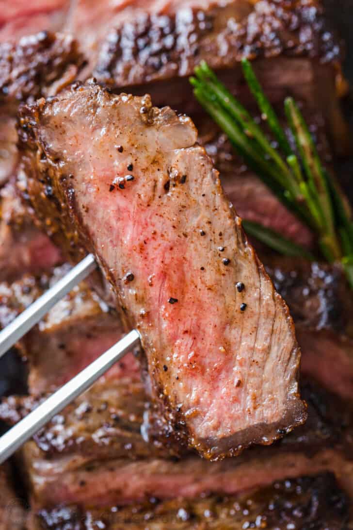 Slice of steak cooked to medium doneness 