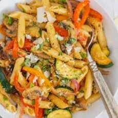 Pasta Primavera garnished with parmesan cheese