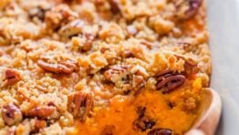 Sweet potato casserole recipe with serving spoon