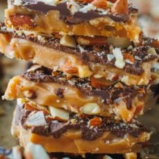 Toffee candy stacked up high with almonds and chocolate