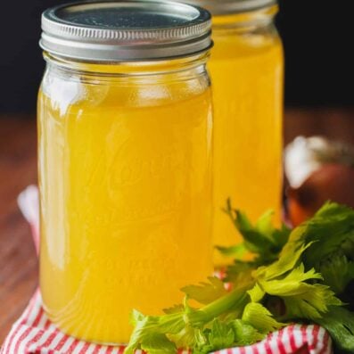 Turkey bone broth made from roasted Thanksgiving turkey and stored in glass jars